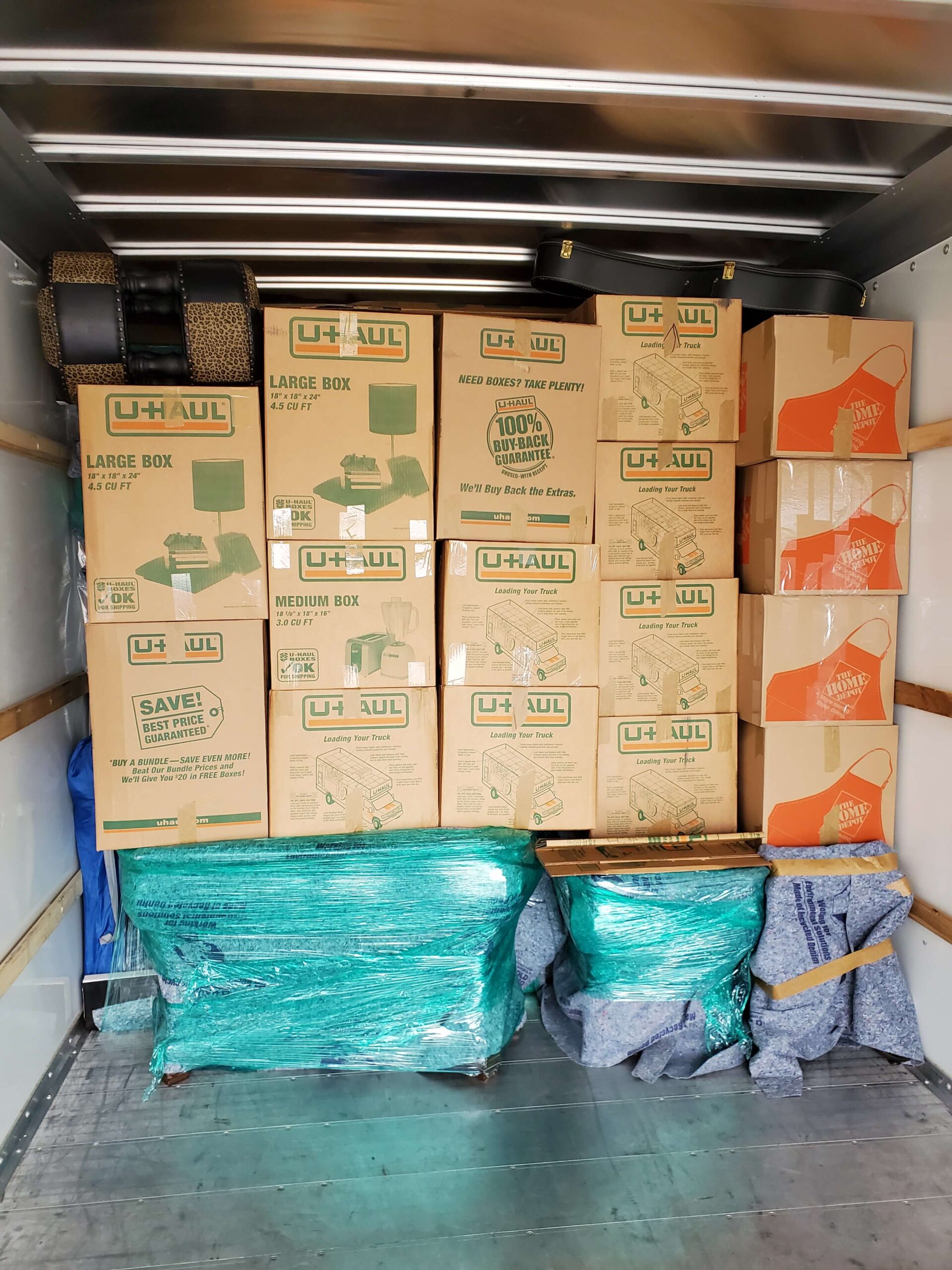 An image of packed boxes in U Haul truck.