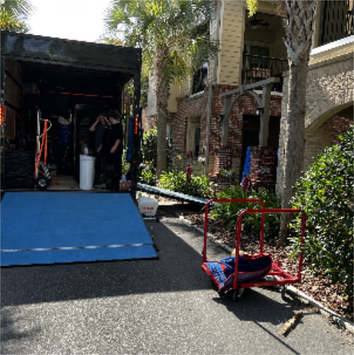 An image of Skye Moving LLC loading the truck with items for local moving.